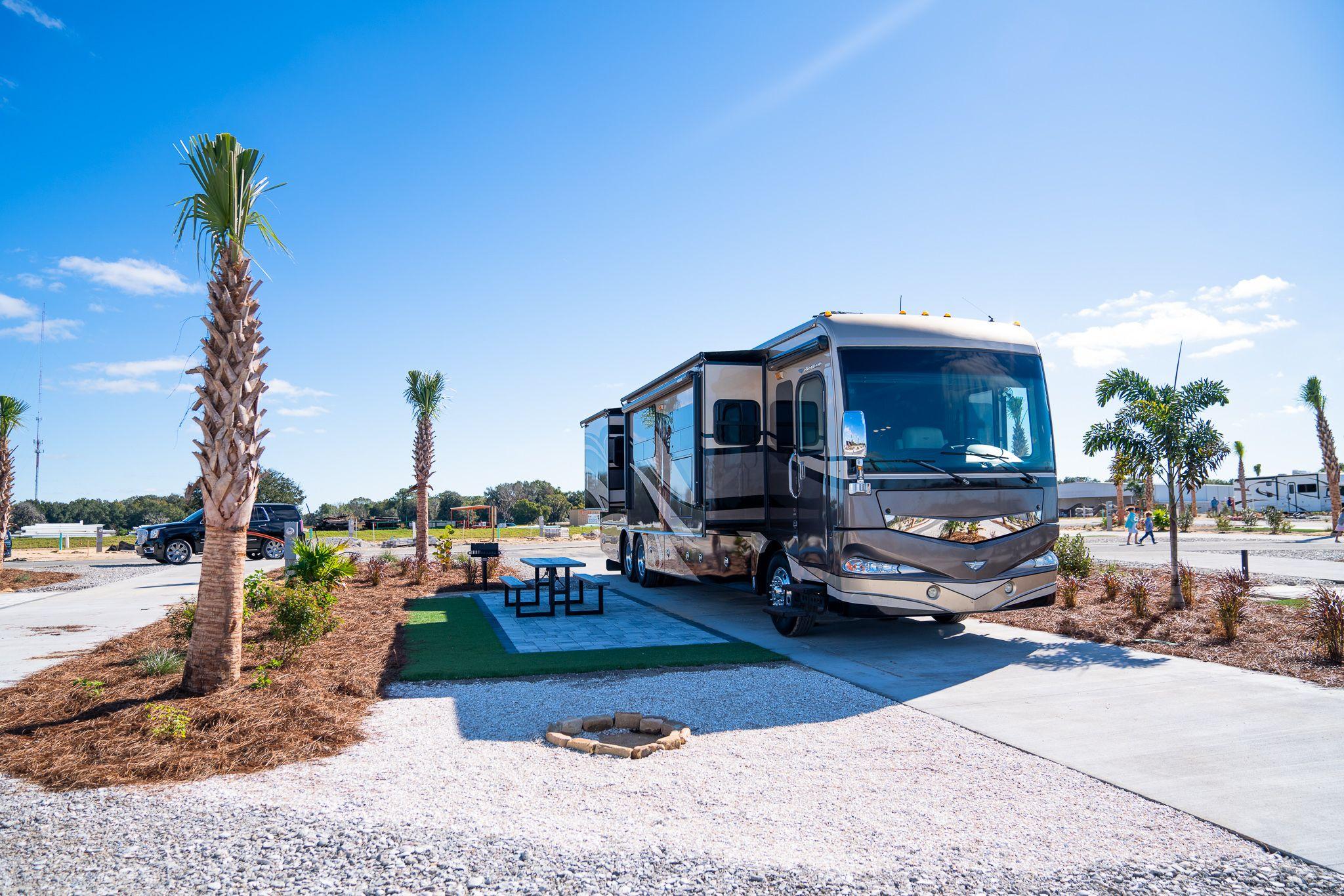 40-foot Class A motorhome parked at a spacious RV park site